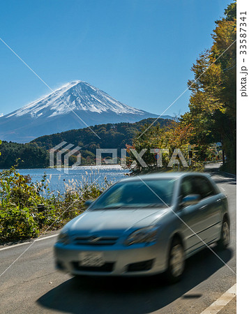 Car driving near Mt Fuji in Japan with motion blur 33587341
