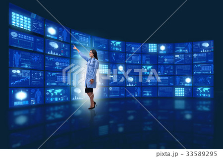Doctor in telemedicine concept pressing buttons 33589295