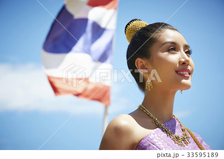 The portrait of Thai girl looking up the sky 33595189