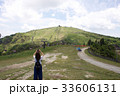 写真を撮る女性 33606131