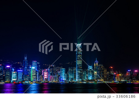 香港の夜景とレーザーショーの写真素材