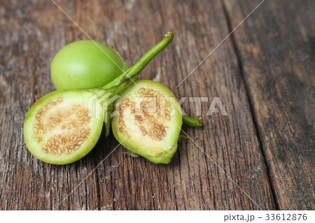 eggplant. one cut in slices,fresh organic green 33612876