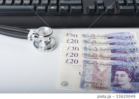 Stethoscope,money, keyboard on white. 33620049