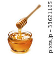Honey pot and dipper high above isolated on white Honey pot and dipper high above isolated on white 33621165