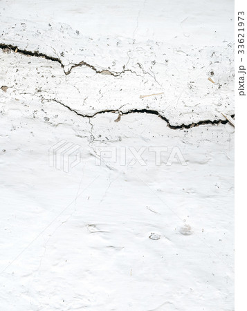 White wall texture with cracks for background. 33621973
