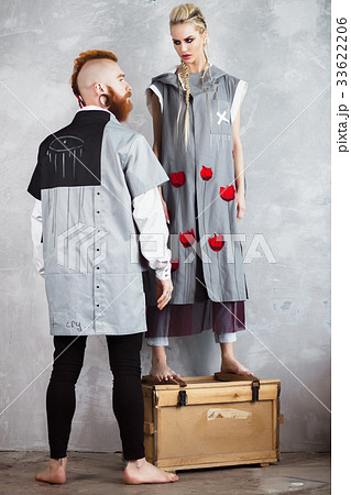 Creative unusual blond girl and red-haired man in 33622206