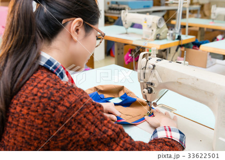 attractive beauty female sewing employee 33622501