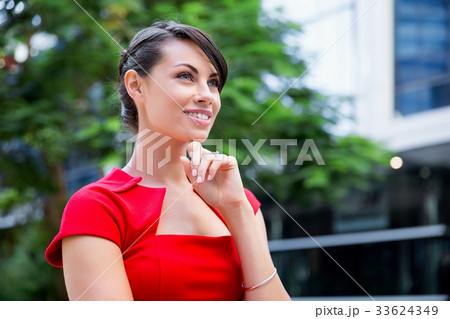 Portrait of businesswoman outside 33624349