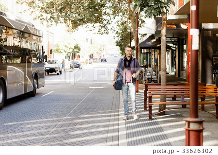 Male tourist in city Male tourist in city 33626302