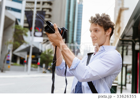 Male photographer taking picture Male photographer taking picture 33626355