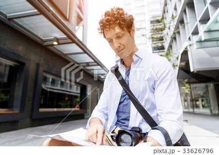Male tourist in city Male tourist in city 33626796