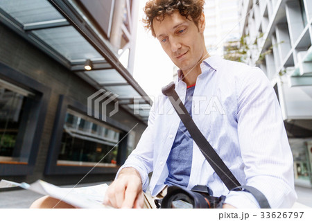Male tourist in city Male tourist in city 33626797
