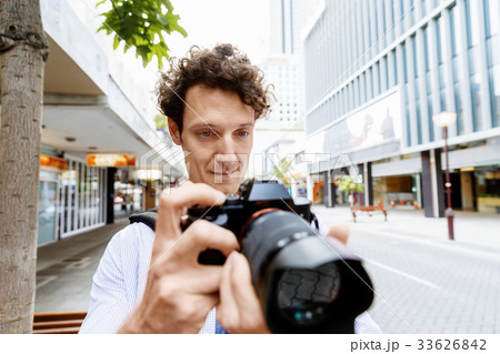 Male photographer taking picture Male photographer taking picture 33626842