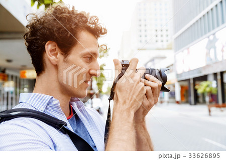 Male photographer taking picture Male photographer taking picture 33626895
