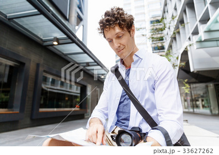 Male tourist in city Male tourist in city 33627262
