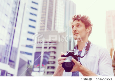 Male photographer taking picture Male photographer taking picture 33627354