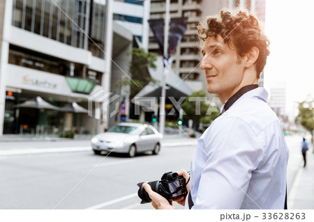 Male photographer taking picture Male photographer taking picture 33628263