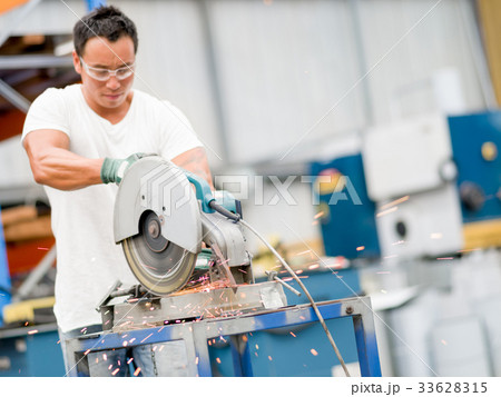 Asian worker in production plant on the factory floor 33628315