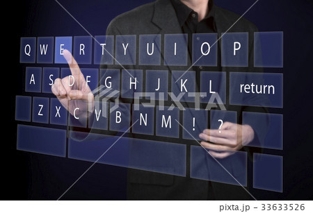 Pointing his finger on virtual qwerty keyboard 33633526