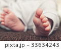 Baby's feet 33634243