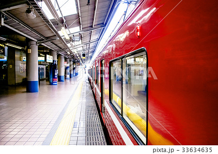 Red Local train at Keikyu Yokohama station, Japan 33634635