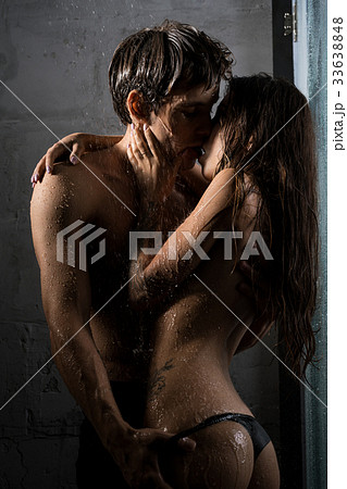 Attractive sexy couple shot in passionate embrace Attractive sexy couple shot in passionate embrace 33638848