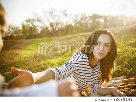 Mother with her baby daughter in autumn park 33639148