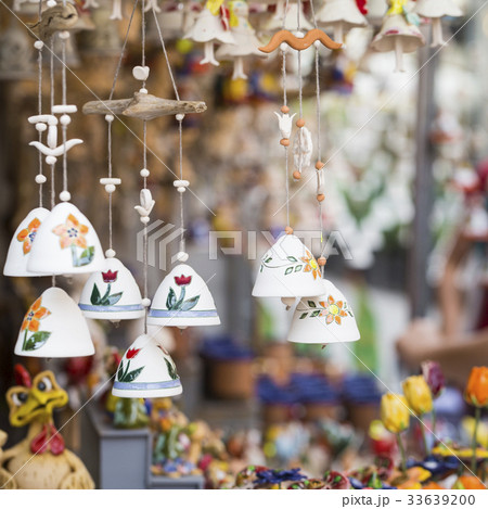 Ceramic bells as a souvenir in local traditional m 33639200