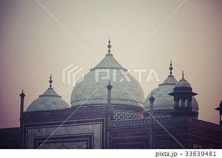 Amazing view on the Taj Mahal in sunset light Amazing view on the Taj Mahal in sunset light 33639481