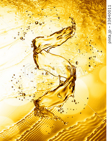 Water splash in the form of spiral gold color Water splash in the form of spiral gold color 33640011