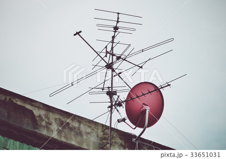 Old dish satellite receiver with blue sky Old dish satellite receiver with blue sky 33651031