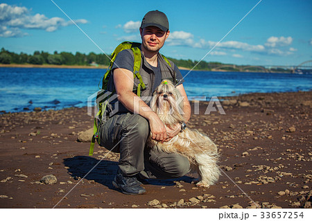 Man tourist with dog Man tourist with dog 33657254