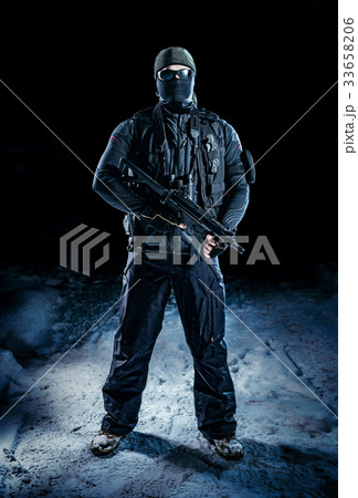 Military man with weapon 33658206