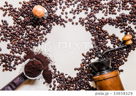 Coffee bean, wooden grinder, portafilter, tamper 33658329