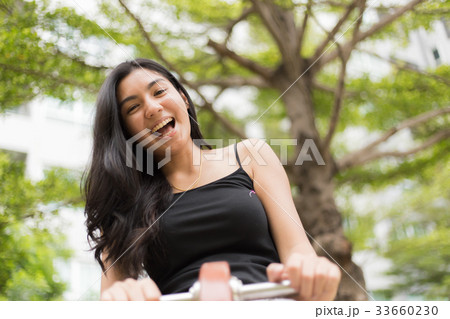 A portrait of a beautiful asian woman smiling A portrait of a beautiful asian woman smiling 33660230