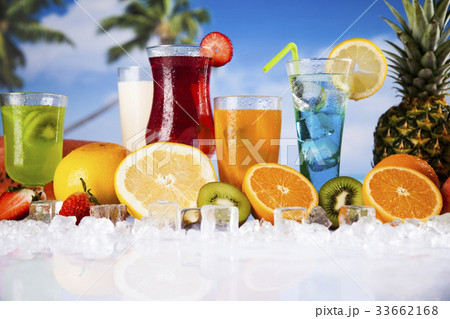 Fresh tropical fruits,Summer drink and palm branch Fresh tropical fruits,Summer drink and palm branch 33662168