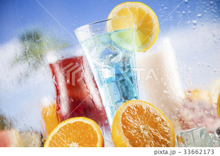 Summer drink,palm branch and Fresh tropical fruits Summer drink,palm branch and Fresh tropical fruits 33662173