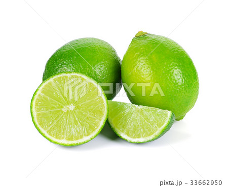 Limes with slices isolated on white background. Limes with slices isolated on white background. 33662950