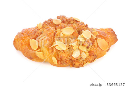 Croissant with almond on a white background 33663127