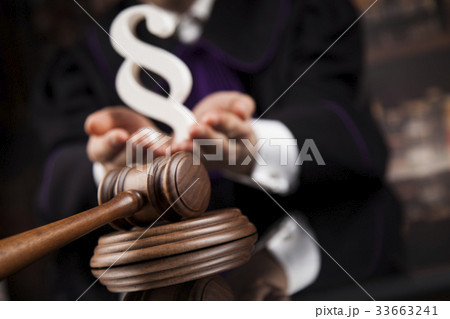 Striking mallet, Judgment concept, book background 33663241