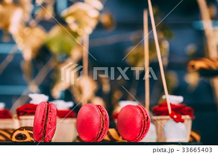 Dessert Sweet Tasty Macarons In Candy Bar On Table Dessert Sweet Tasty Macarons In Candy Bar On Table 33665403