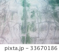 Dirty old concrete wall, stained dark green moss  33670186