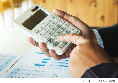 business man working on business documents 33671000