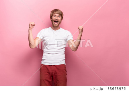 Portrait of young man with happy facial expression 33673976