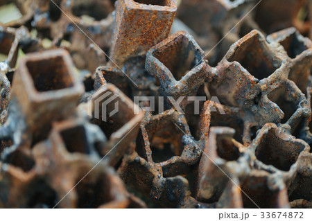 Old and rusty square pipes. Old and rusty square pipes. 33674872