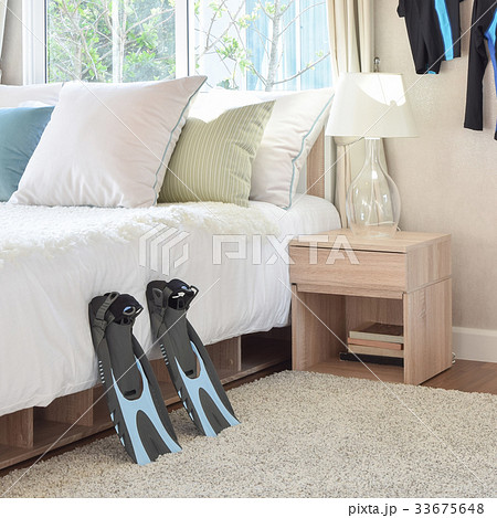 stylish bedroom with colorful pillows stylish bedroom with colorful pillows 33675648