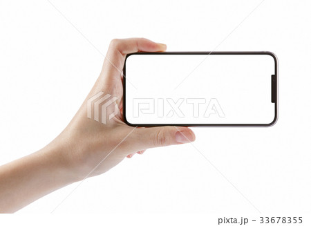 Girl hand holding smartphone on white 33678355