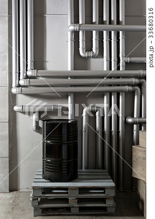 black barrel and tubing - concept. silver pipeline 33680316