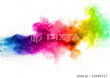 Multicolored powder explosion on white background. 33680317
