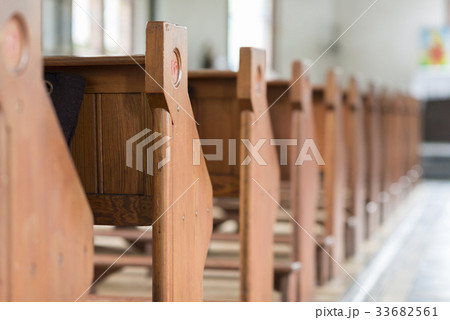 Pews in an old church. 33682561